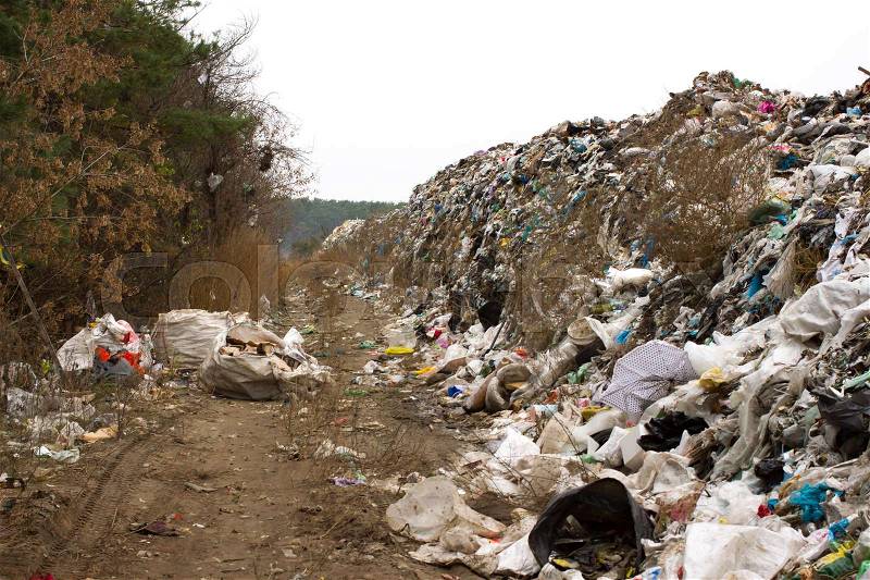 Landfill in Ukraine, piles of plastic dumped in piles. The roads along inorganic waste jumble, Air, ground pollution, stock photo