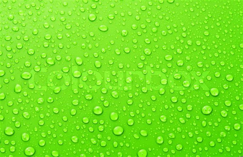 Beautiful green water drops background, stock photo