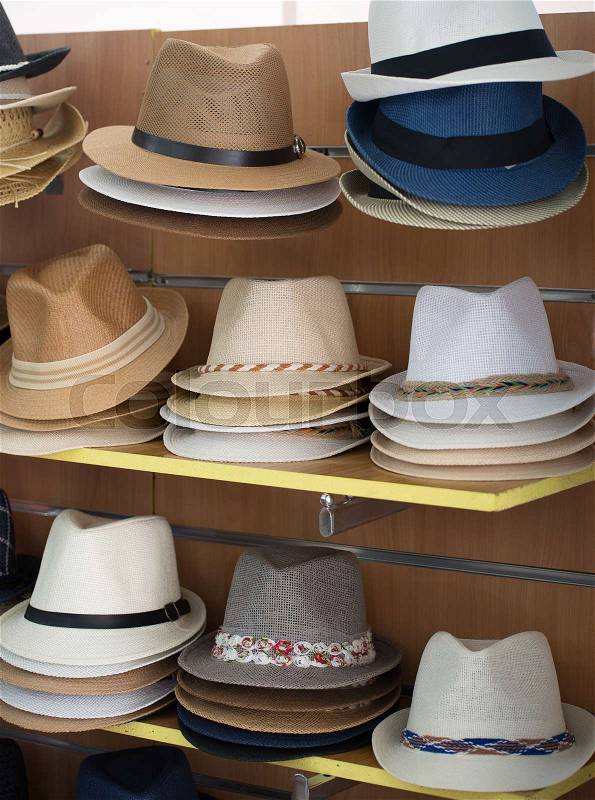 Variety of hats for sale in the market, stock photo