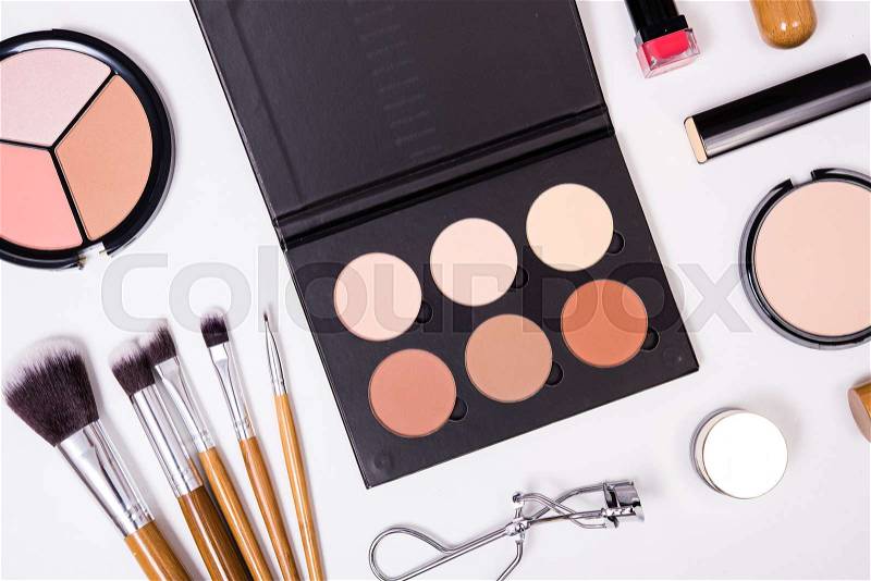 Professional makeup brushes and tools, make-up products kit, flatlay on white background, stock photo