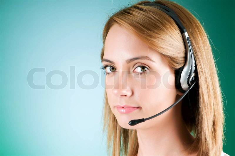 Young call center operator with the headset, stock photo