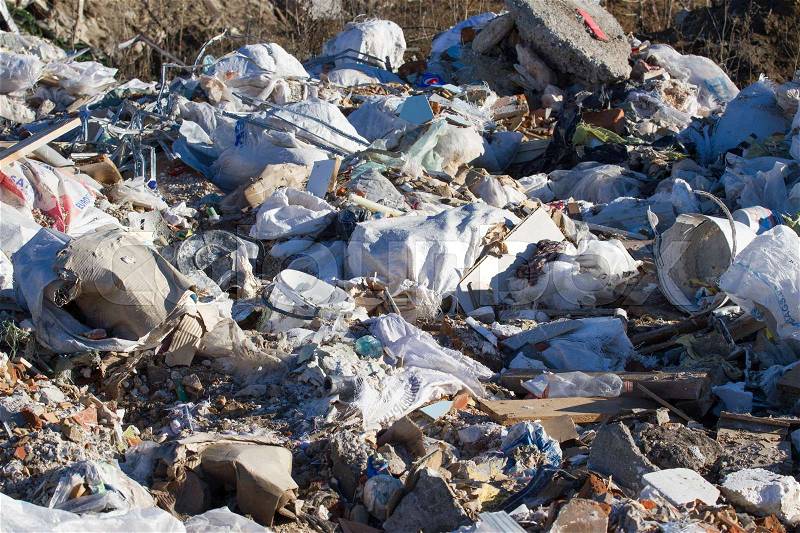 Landfill in Ukraine, piles of plastic dumped in piles. The roads along inorganic waste jumble, Air, ground pollution. Lviv, stock photo