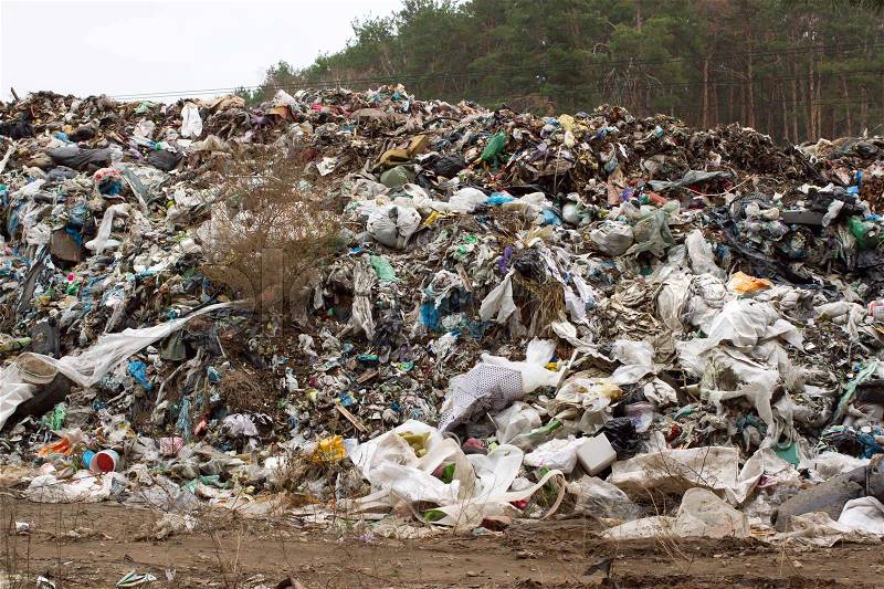 Landfill in Ukraine, piles of plastic dumped in piles. The roads along inorganic waste jumble, Air, ground pollution, stock photo