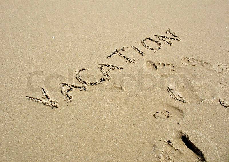 The word VACATION written in the sand ... | Stock Photo ...