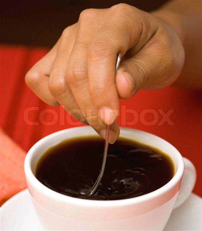 Fresh Coffee With An Aroma Being Stirred, stock photo