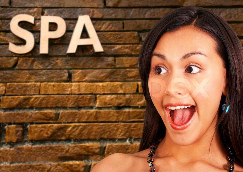Happy Girl Standing Outside A Spa, stock photo