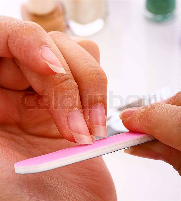Filing Fingernails Ready For Nail Polish To Keep Beautiful, stock photo