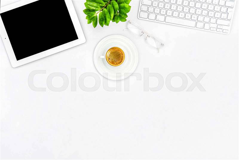 Office desk with coffee, keyboard, tablet pc. Flat lay. Mock up for social media blogger, stock photo