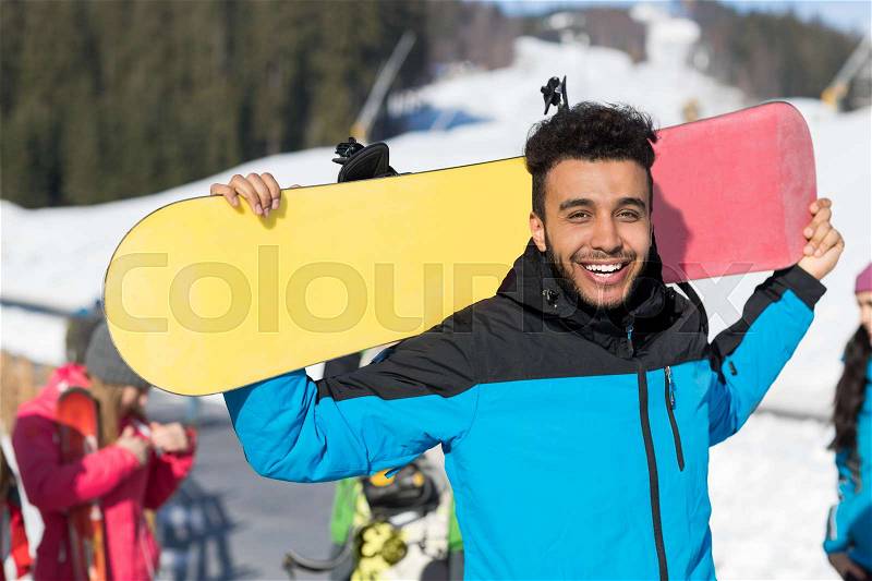 Hispanic Man Hold Snowboard Ski Resort Winter Snow Mountain Cheerful Happy Smiling Guy Holiday Extreme Sport Vacation, stock photo