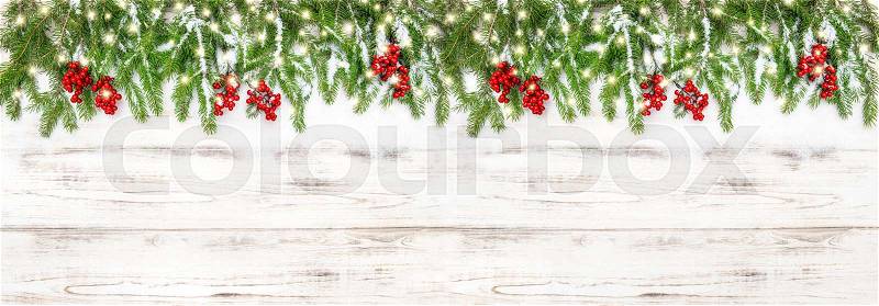 Christmas decoration red berries and golden lights. Christmas holidays banner, stock photo