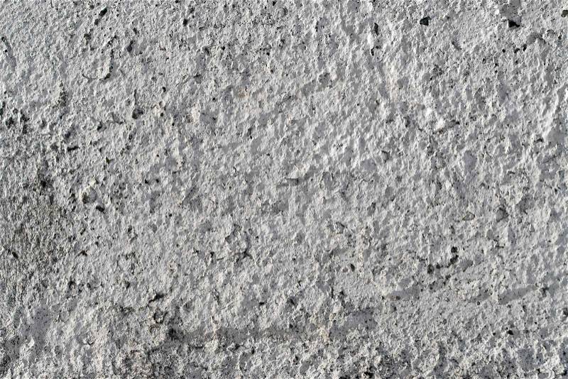 A white stone texture that works great as a background, stock photo