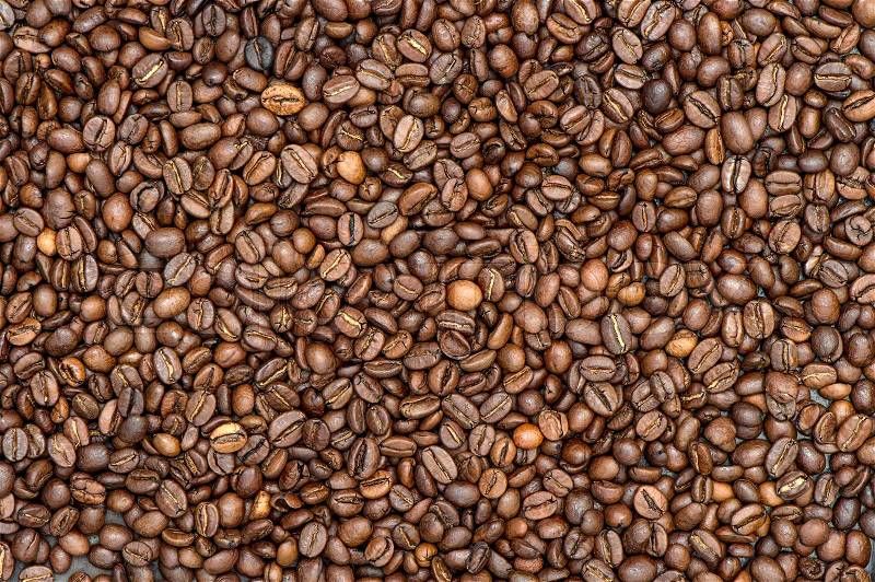 Coffee background texture. Brown coffee beans, stock photo