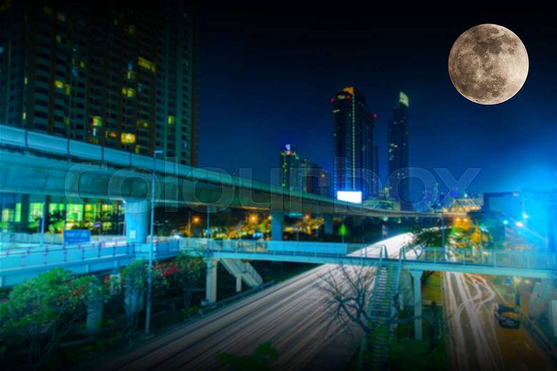 Full moon over the city at night, Super moon, stock photo