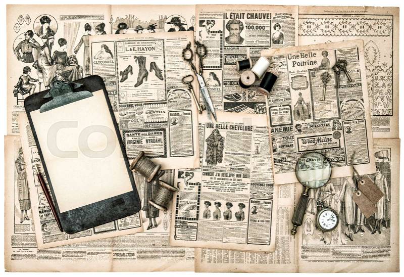 Antique accessories, sewing and writing tools, old fashion magazine for the woman. Vintage style toned picture, stock photo