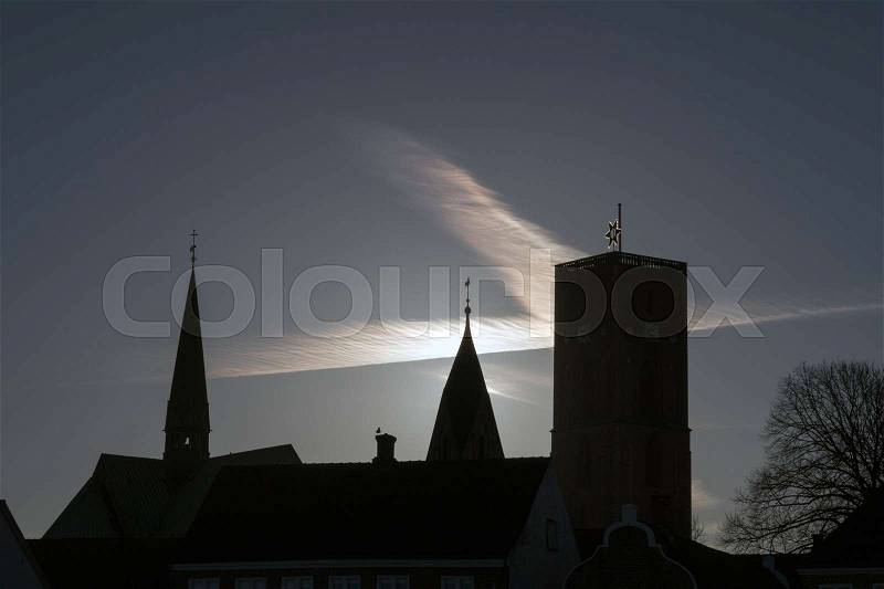 Ribe Cathedral in backlit. Famous Danish landmark, stock photo