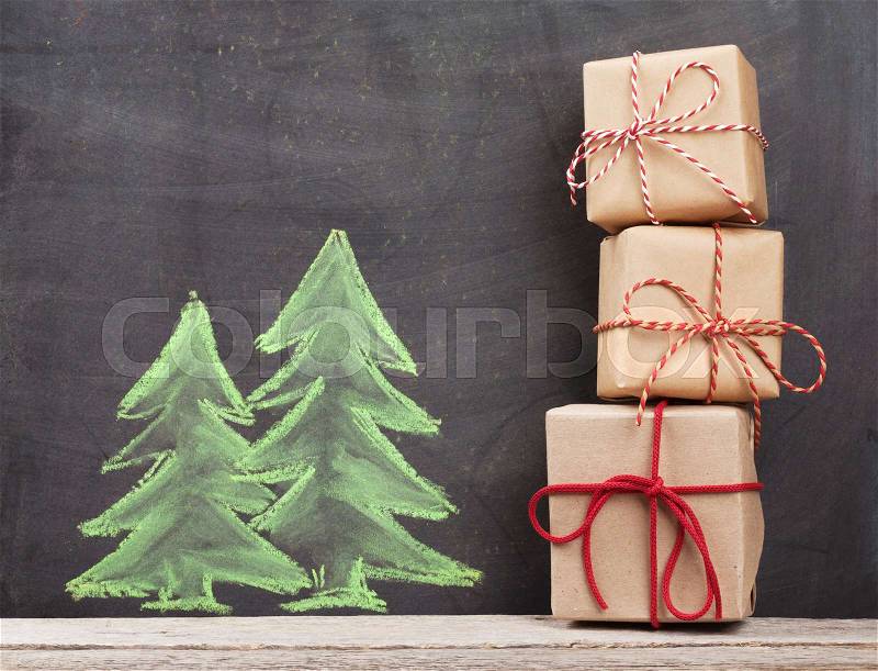 Christmas gift boxes and hand drawn xmas fir tree, stock photo