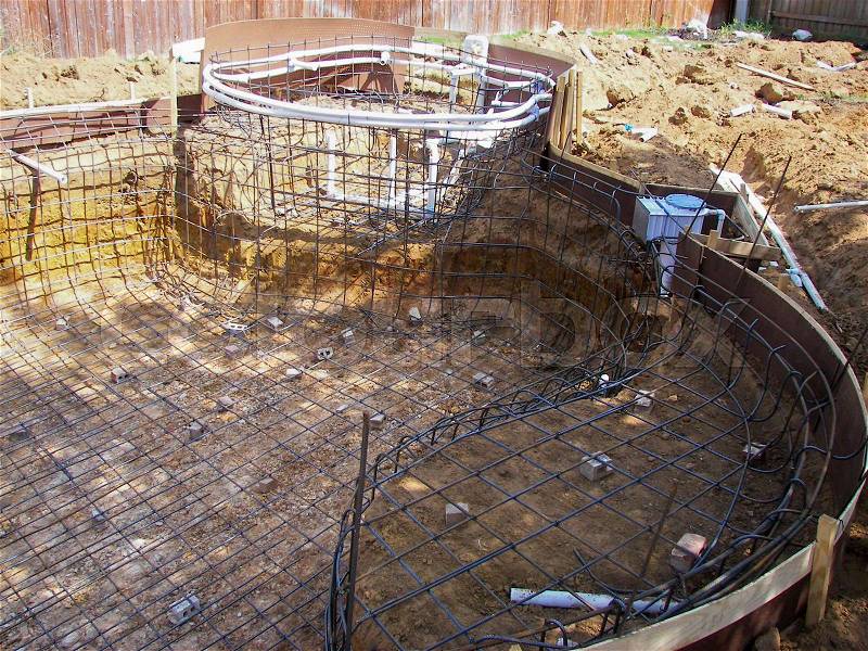 Outdoor swimming pool under contruction, stock photo
