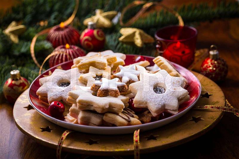 Christmas cookies and gingerbread with chandles, stock photo