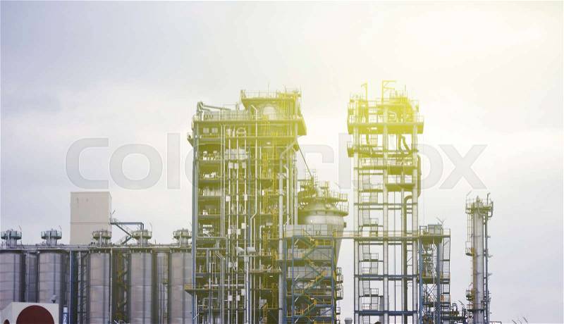 Modern chemical factory with lots of tubes - worldwide industry on a sunny day, stock photo