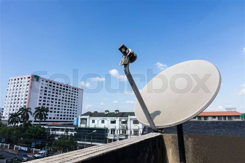 Satellite dishes or satellite antennas mounted on the home, stock photo