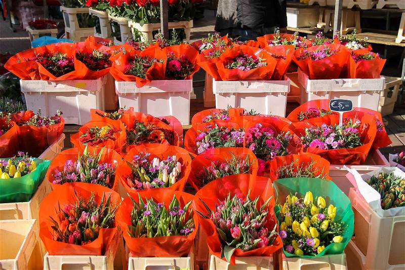 Street flower shop with colourful tulip bouquets. Utrecht, the Netherlands, stock photo