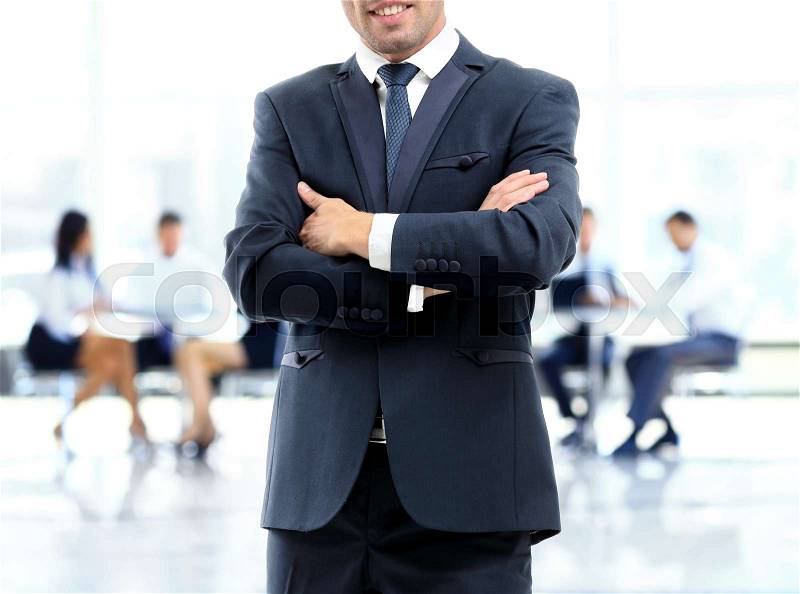 Businessman in contemporary office, stock photo