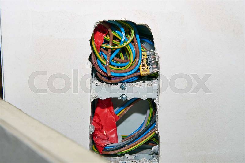 Preparation and installation of a electrical network in home, stock photo