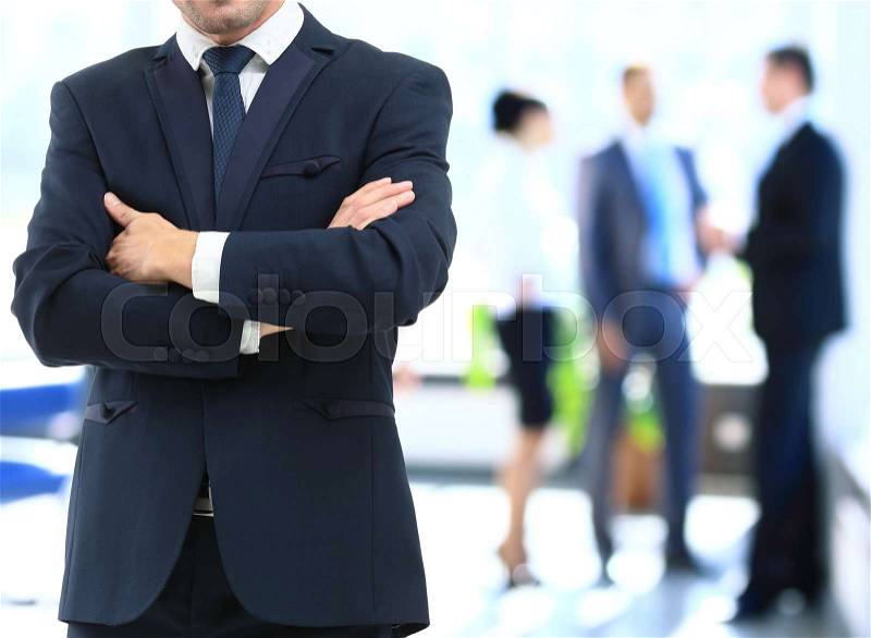 Businessman in contemporary office, stock photo