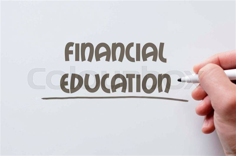 Human hand writing financial education on whiteboard, stock photo