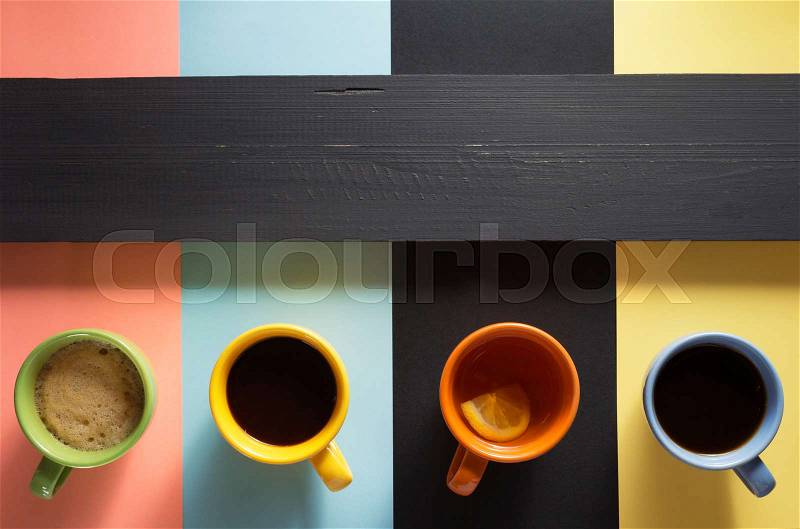 Cup of coffee, tea and cacao at colorful background, stock photo
