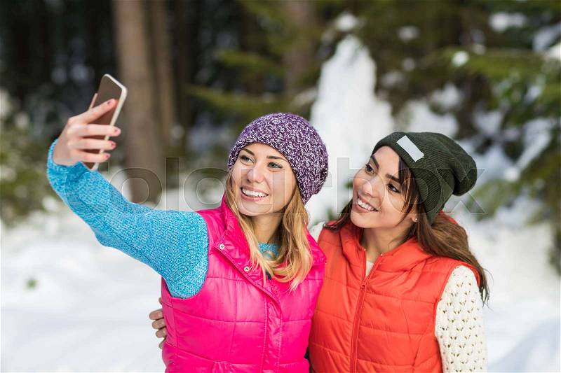 Girl Hold Smart Phone Camera Taking Selfie Photo Snow Forest Young Woman Couple Outdoor Winter Pine Woods, stock photo