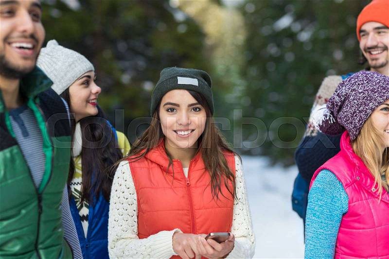 Asian Woman Using Smart Phone Snow Forest Happy Smiling Young People Group Walking Outdoor Winter Pine Woods, stock photo
