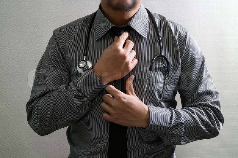 Smart medical doctor holding digital tablet computer,stethoscope ,front view,filter effect, stock photo