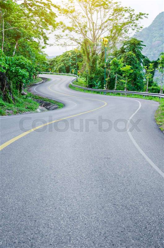 An empty S-Curved road on skyline drive in the green view, stock photo