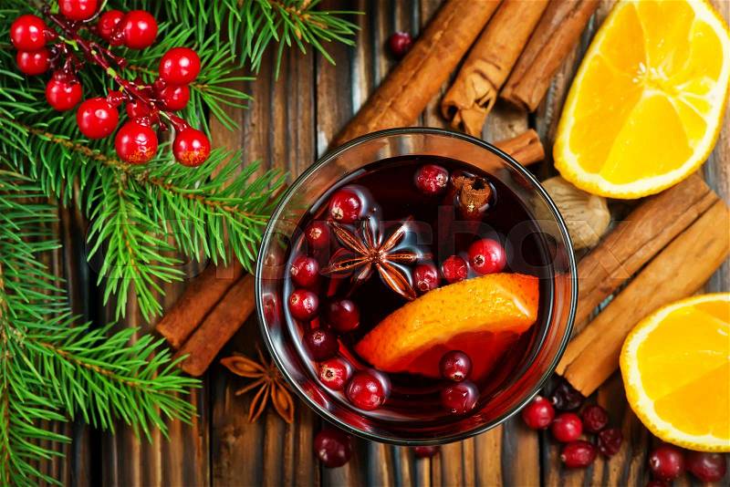 Christmas drink with fruits and aroma spice, stock photo
