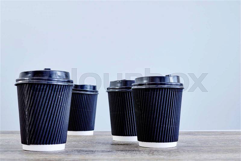 A studio photo of a takeaway coffee cup, stock photo