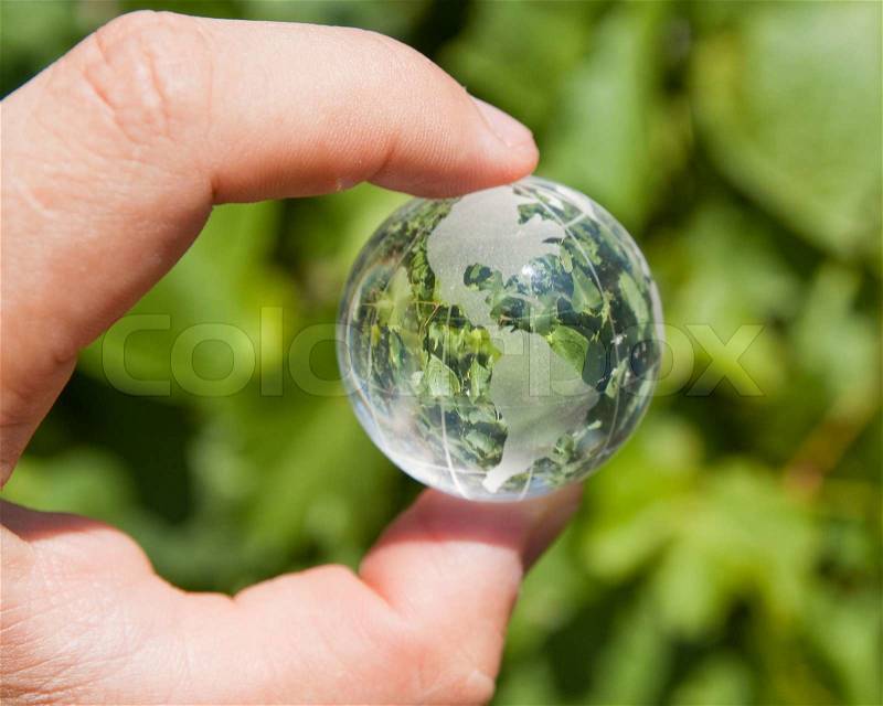 Erth in hand green above, stock photo