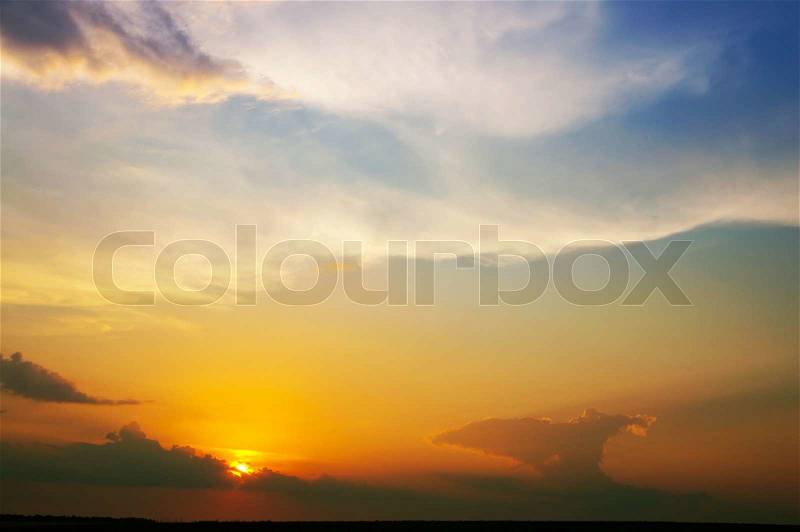 Fine evening glow under low clouds, stock photo