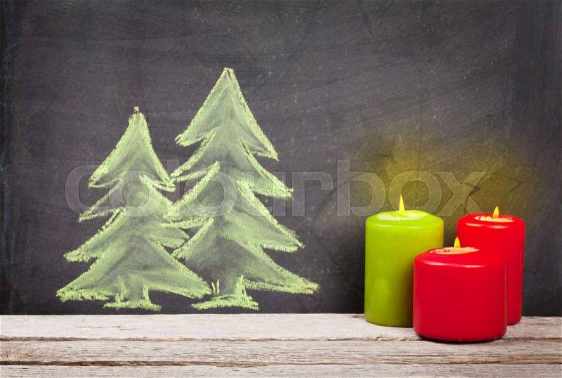 Christmas candles and hand drawn xmas fir tree, stock photo