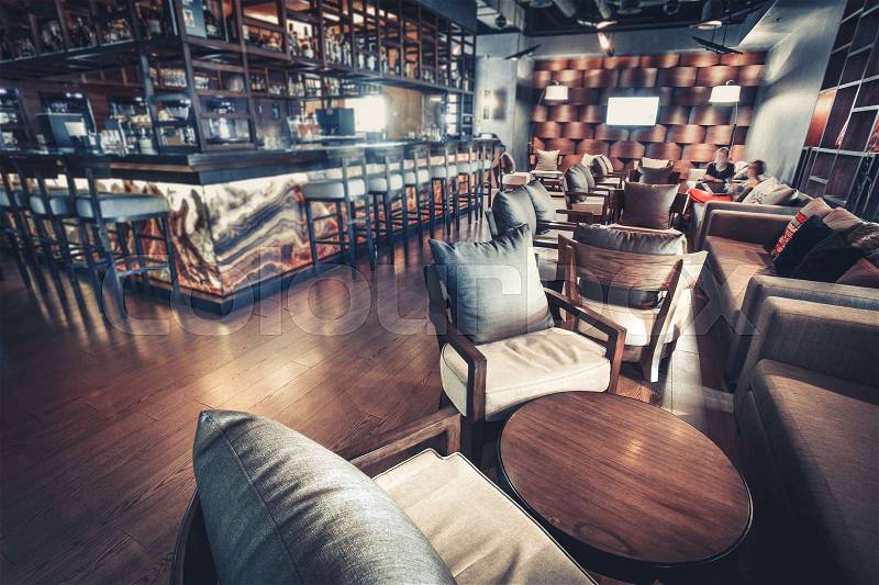 Luxury restaurant interior,overlooking lounge area and bar, stock photo