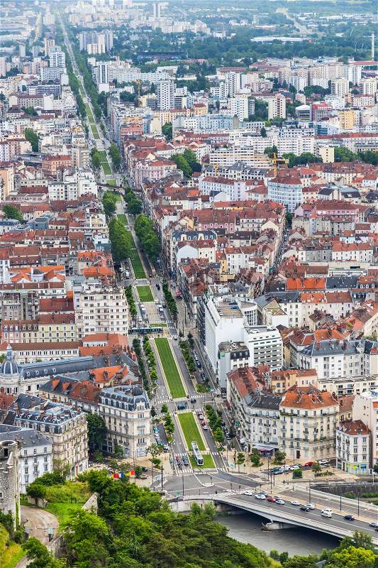 Grenoble city, France. Picturesque aerial view from Bastille in summer cloudy day, stock photo