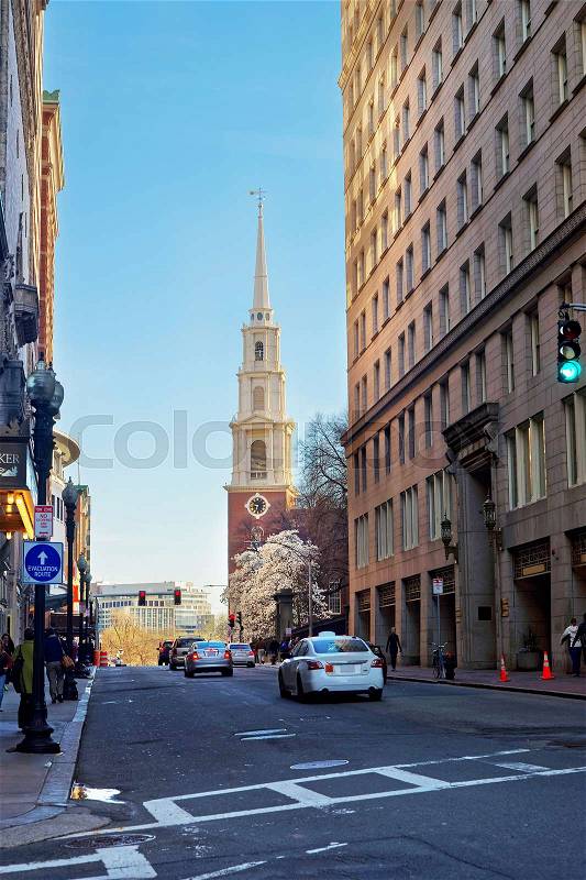 Boston, USA - April 28, 2015: Park Street Church in Tremont Street in downtown Boston, Massachusetts, the United States. People on the background, stock photo