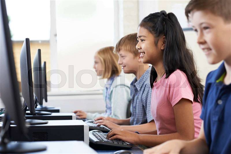 Elementary Pupils In Computer Class , stock photo