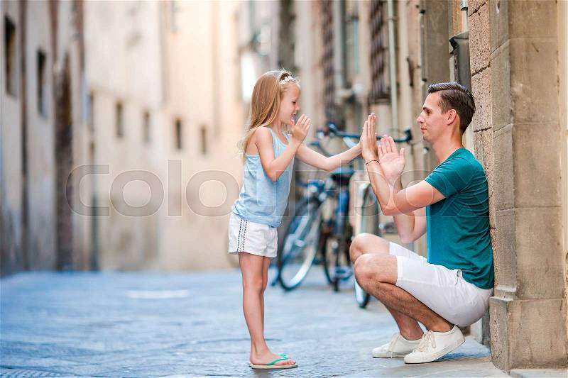 Family in Europe. Happy father and little adorable girl in Rome during summer italian vacation, stock photo