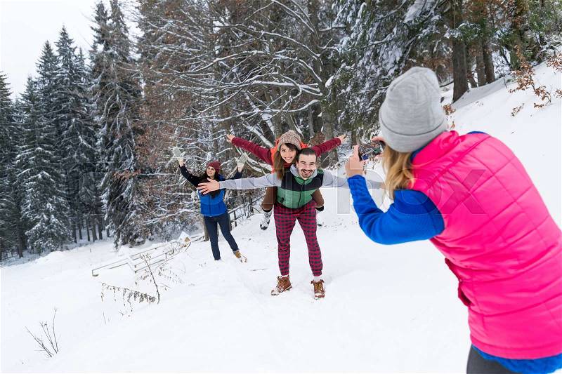 Woman Taking Photo On Smart Phone People Group Winter Snow Mountain Forest, Young Friends Christmas Holiday Vacation, stock photo