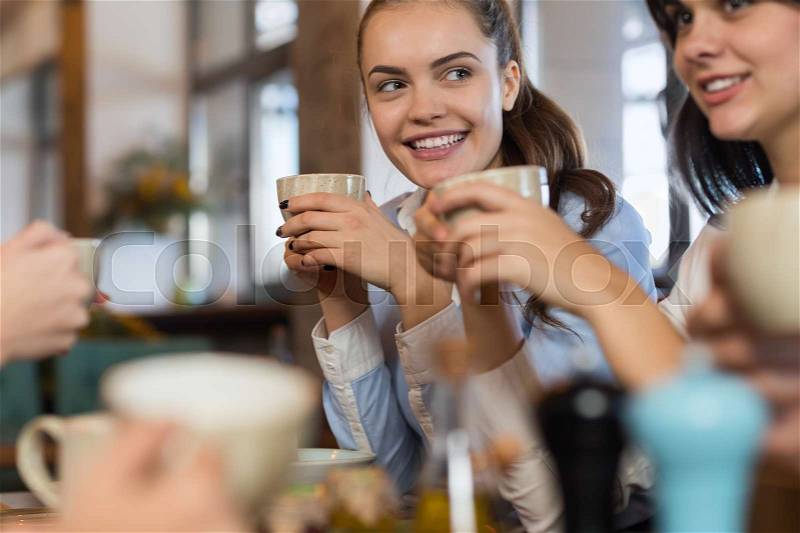 Young Business People Group Drink Coffee Sitting Cafe Table, Woman Hold Cup Smiling Talking, stock photo