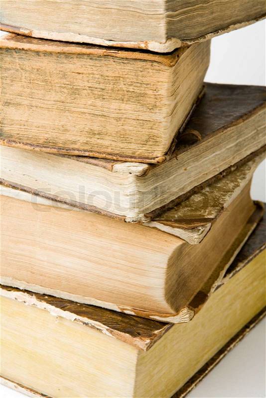 Pile of old books on white background, stock photo