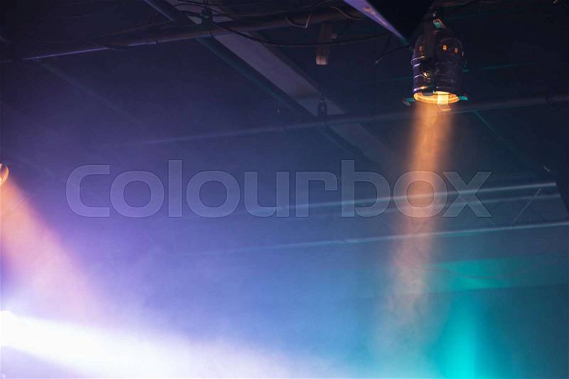 Spot lights over dark ceiling background, stage illumination equipment, stock photo