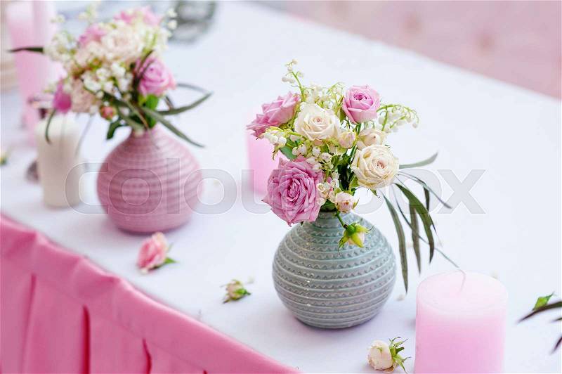 Wedding decorations on a table in the restaurant, stock photo