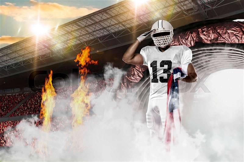 Football Player with a White uniform coming out of a stadium tunnel, stock photo